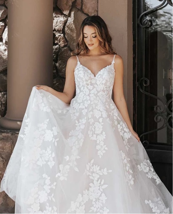 Photo of the model wearing a bridal collection