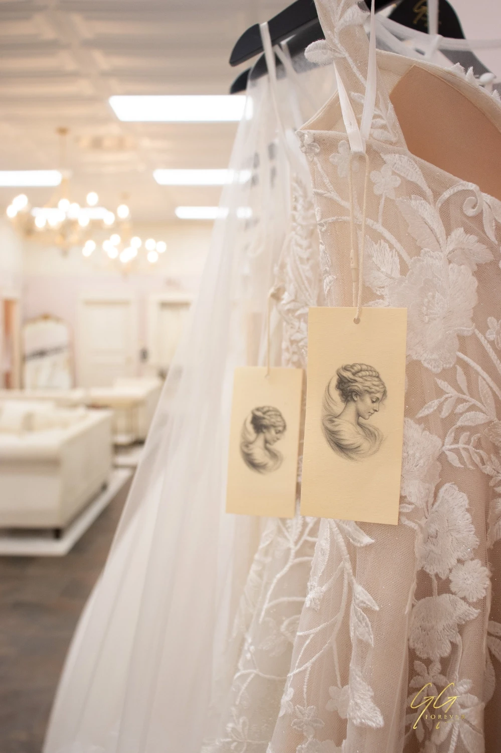 Photo of wedding dresses on the rack with labels