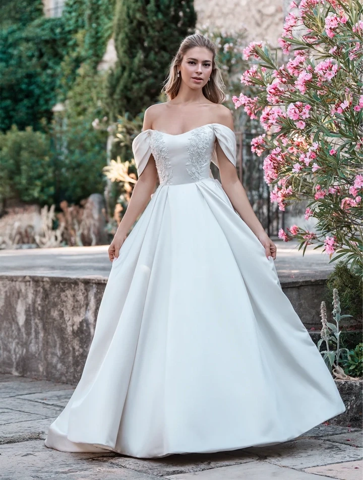 Photo of the model wearing a bridal dress