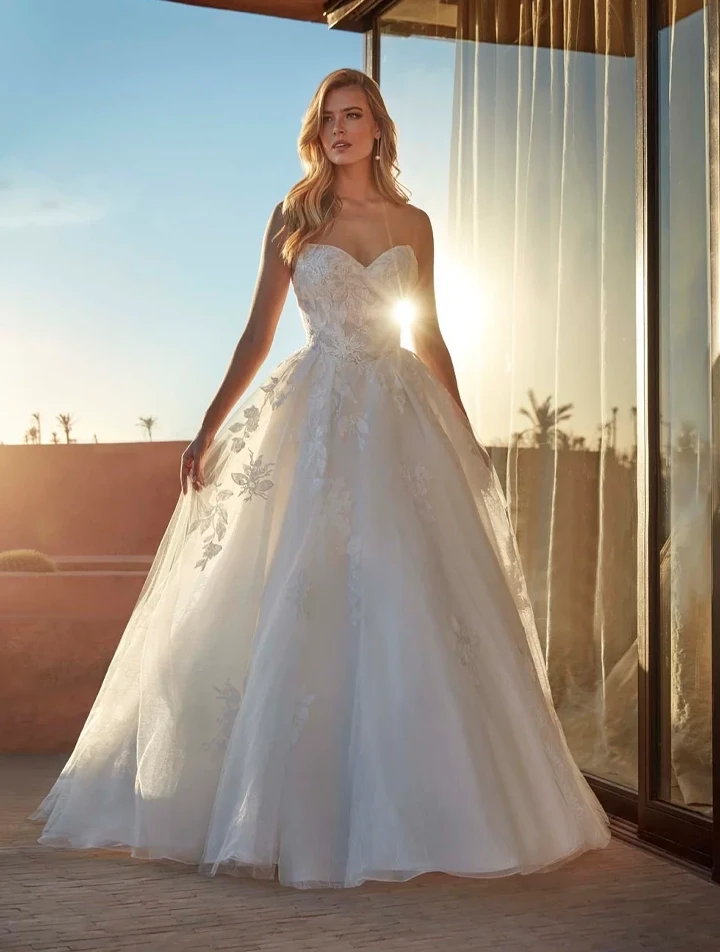 Photo of the model wearing a bridal dress