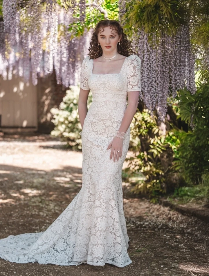 Photo of the model wearing a bridal dress